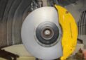 Porsche Panamera front wheel upgrade Original factory top with Akibono 10-piston calipers with 420 gauge PCCB carbon tray set original position upgrade installation
